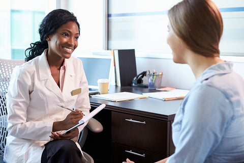 woman speaking to her doctor