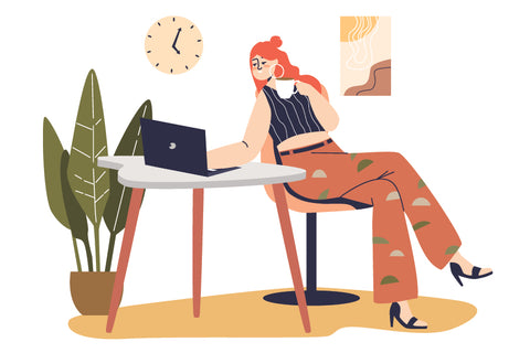 someone online shopping at a desk 